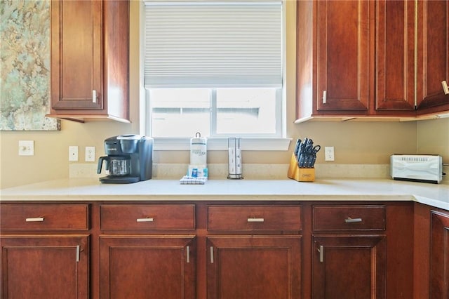 kitchen featuring light countertops