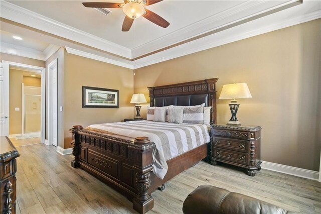 bedroom with ornamental molding, ceiling fan, baseboards, and wood finished floors