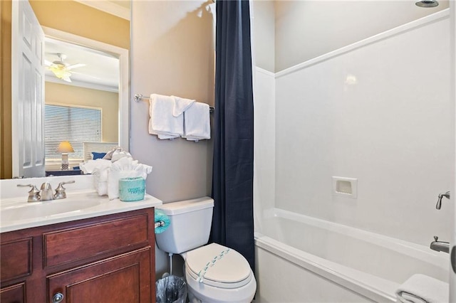 bathroom with shower / tub combo, vanity, toilet, and a ceiling fan