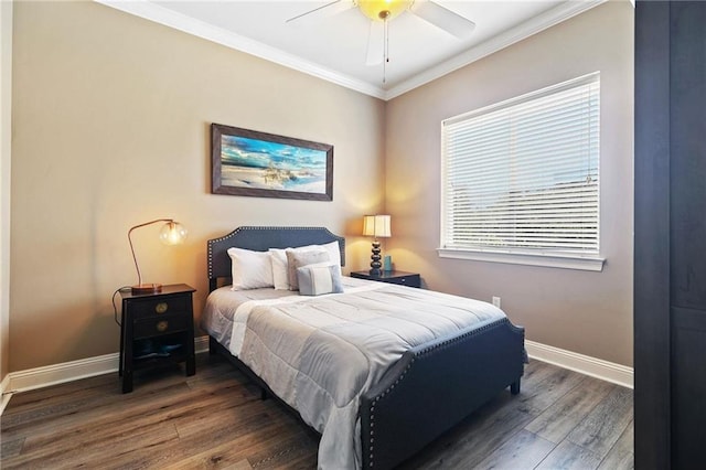 bedroom with ornamental molding, wood finished floors, a ceiling fan, and baseboards