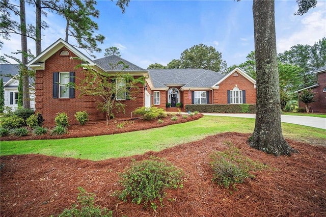 view of front of property with a front lawn