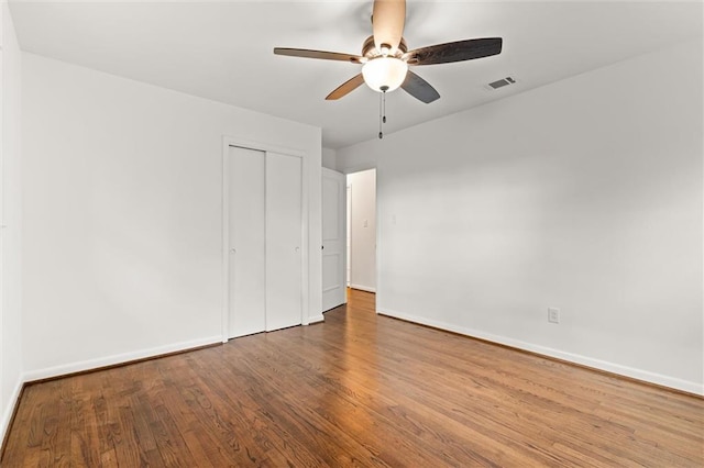 3510 Zimlich Ave, Mobile, AL 36608 - unfurnished bedroom with wood finished floors, a closet, and ceiling fan