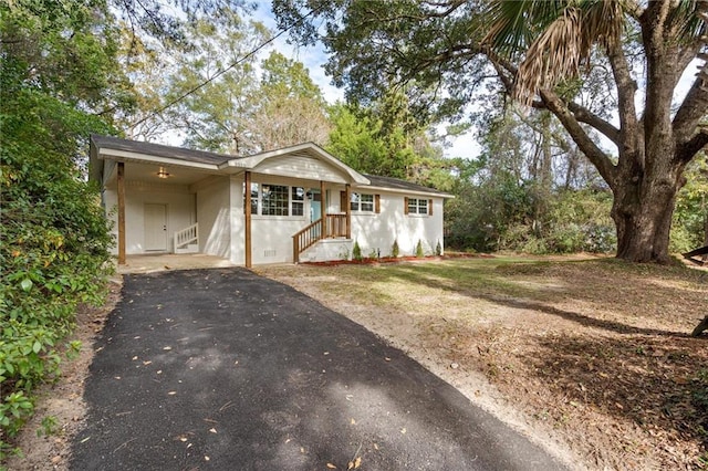 3510 Zimlich Ave, Mobile, AL 36608 - ranch-style home with asphalt driveway and a carport