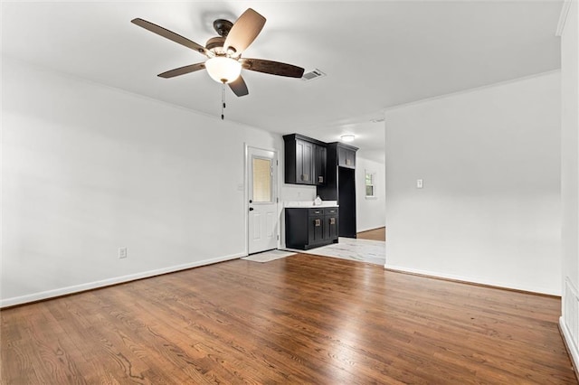 3510 Zimlich Ave, Mobile, AL 36608 - unfurnished living room with ceiling fan and wood finished floors
