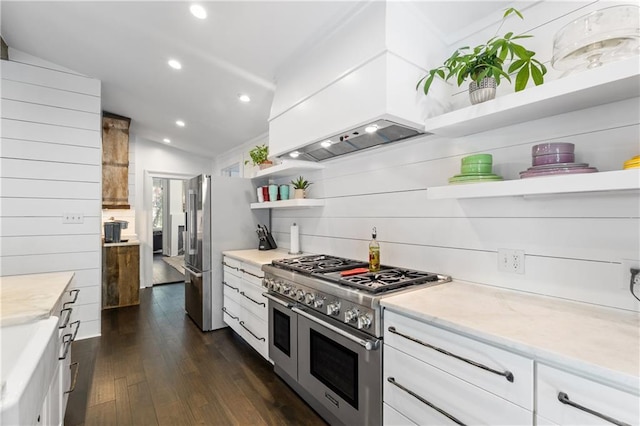 205 George St, Mobile, AL 36604 - kitchen featuring open shelves, appliances with stainless steel finishes, premium range hood, recessed lighting, and dark wood-style flooring