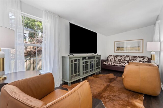 205 George St, Mobile, AL 36604 - living area featuring vaulted ceiling and wood finished floors