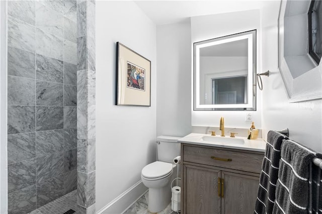 205 George St, Mobile, AL 36604 - full bath with marble look tile flooring, vanity, toilet, a tile shower, and baseboards