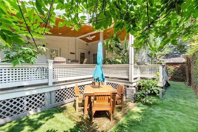 205 George St, Mobile, AL 36604 - view of green lawn with ceiling fan and outdoor dining area