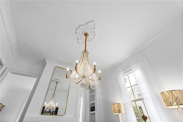 205 George St, Mobile, AL 36604 - detailed view of a chandelier, built in shelves, and ornamental molding