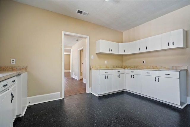 kitchen with white cabinets