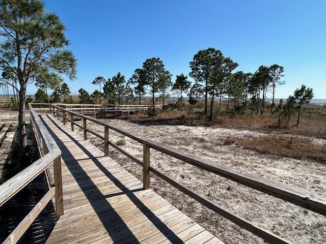 view of dock featuring a rural view