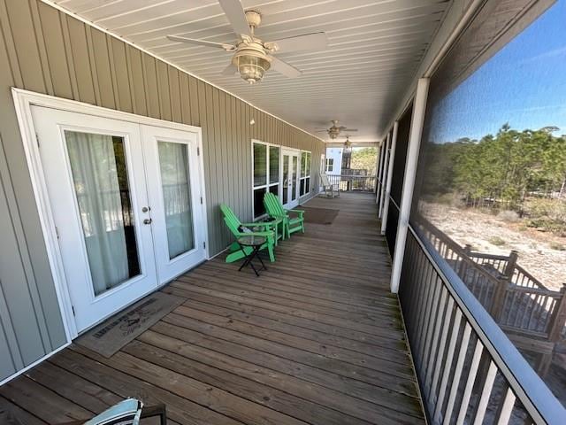 deck featuring french doors and ceiling fan