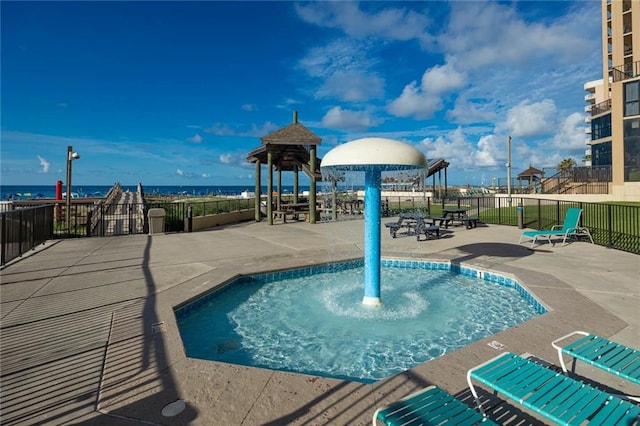 view of swimming pool with a patio