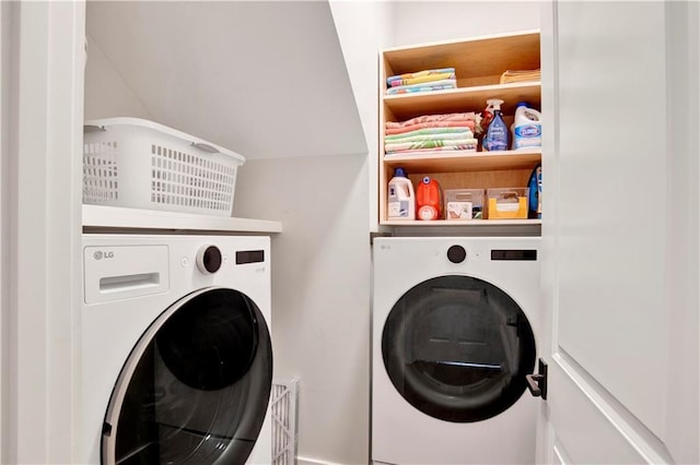 laundry area with independent washer and dryer