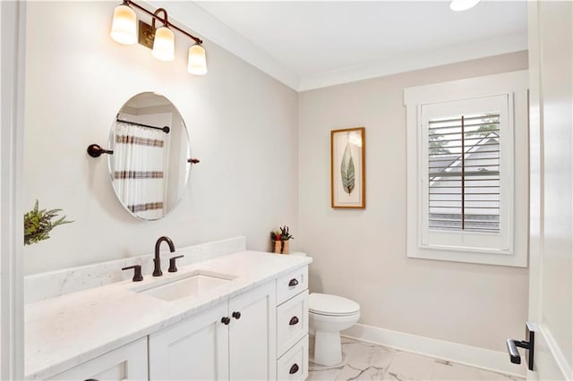 full bathroom with toilet, vanity, baseboards, marble finish floor, and crown molding