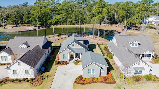 birds eye view of property with a residential view