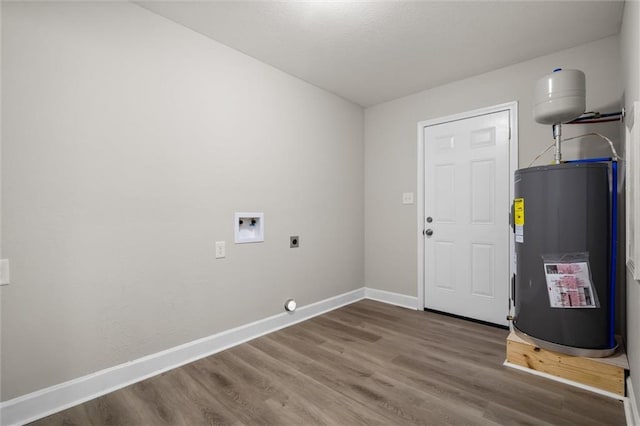 laundry area with hardwood / wood-style floors, hookup for an electric dryer, electric water heater, and hookup for a washing machine