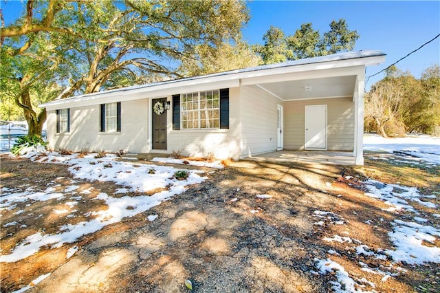 view of front of house with a carport