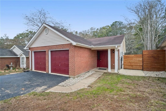 single story home with a garage