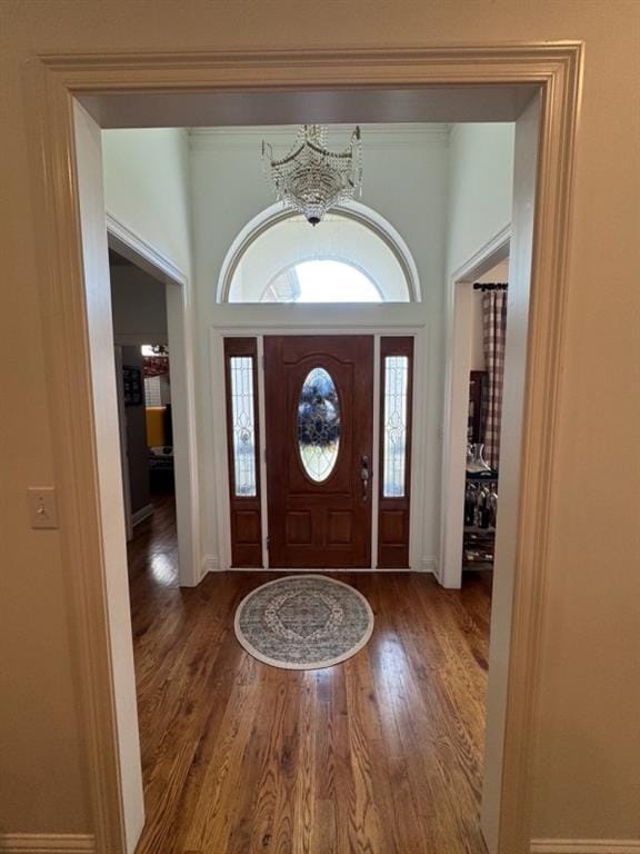 5541 Riverwood Lndg, Theodore, AL 36582 - entrance foyer featuring wood finished floors and a chandelier