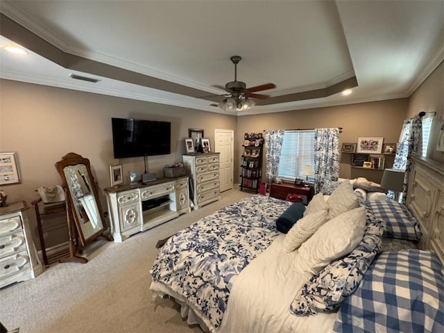 5541 Riverwood Lndg, Theodore, AL 36582 - bedroom featuring a raised ceiling, ornamental molding, carpet floors, and a ceiling fan