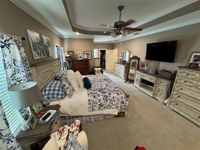 5541 Riverwood Lndg, Theodore, AL 36582 - carpeted bedroom featuring ornamental molding, a tray ceiling, and ceiling fan