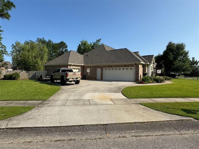 5541 Riverwood Lndg, Theodore, AL 36582 - view of front of property with an attached garage, concrete driveway, and brick siding