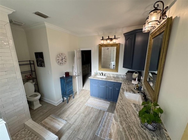 5541 Riverwood Lndg, Theodore, AL 36582 - full bath with vanity, crown molding, and wood finished floors
