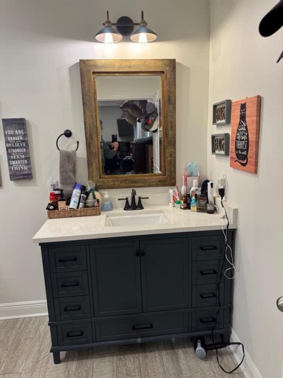 5541 Riverwood Lndg, Theodore, AL 36582 - bathroom with wood finished floors and vanity