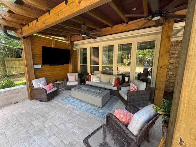 5541 Riverwood Lndg, Theodore, AL 36582 - view of patio featuring ceiling fan and an outdoor living space with a fire pit