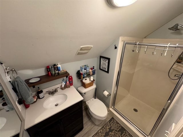 5541 Riverwood Lndg, Theodore, AL 36582 - bathroom featuring vanity, a stall shower, lofted ceiling, and wood finished floors