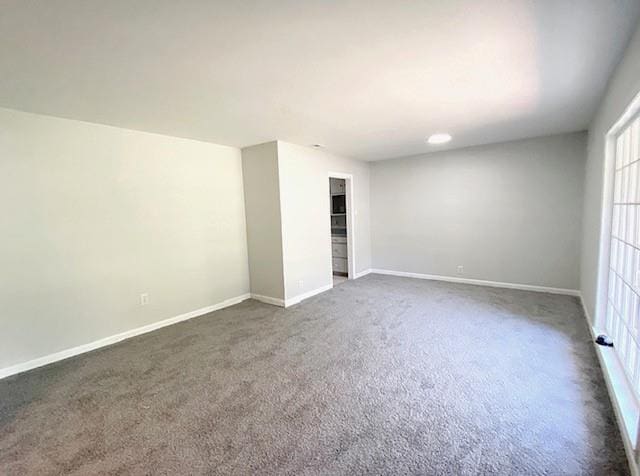 1313 Innsbruck Dr, Mobile, AL 36608 - empty room with dark carpet and baseboards