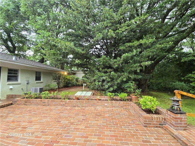 1313 Innsbruck Dr, Mobile, AL 36608 - view of patio featuring central AC
