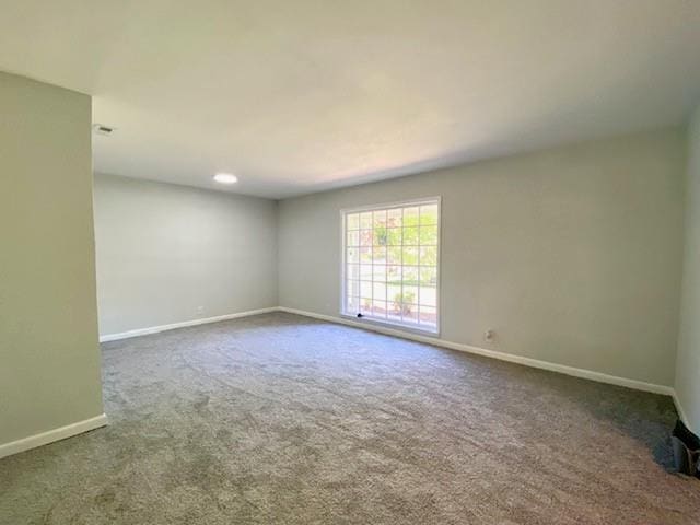 1313 Innsbruck Dr, Mobile, AL 36608 - carpeted empty room with baseboards