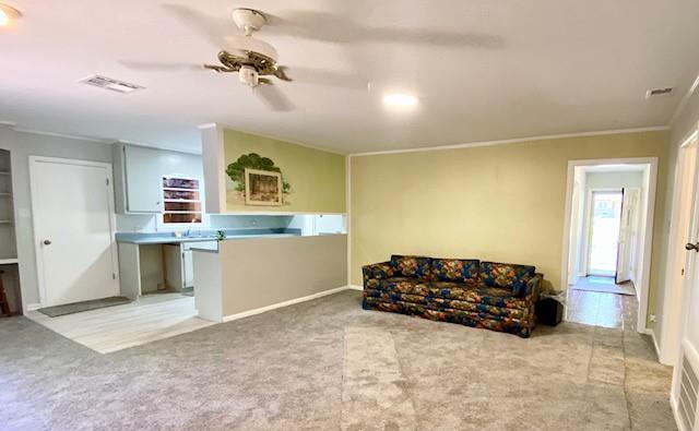 1313 Innsbruck Dr, Mobile, AL 36608 - living area with light carpet and baseboards