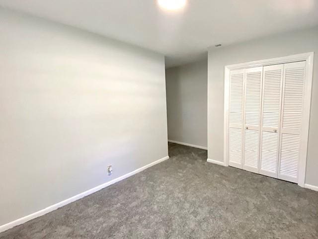 1313 Innsbruck Dr, Mobile, AL 36608 - unfurnished bedroom featuring carpet floors, baseboards, and a closet