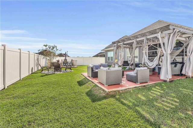 view of yard with an outdoor living space and a patio