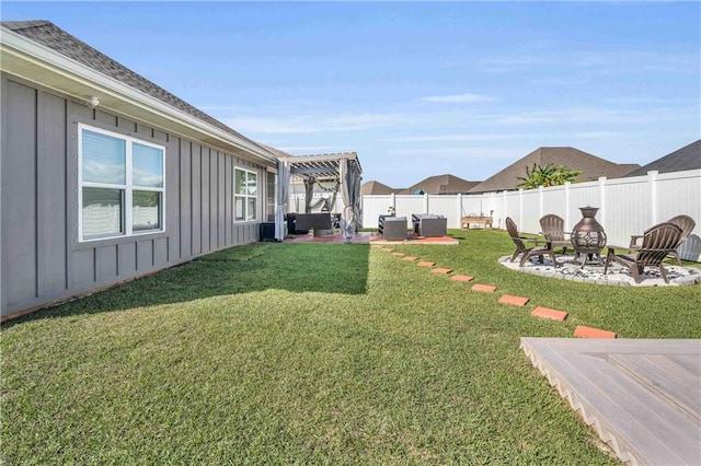 view of yard featuring a pergola, a patio area, and an outdoor hangout area