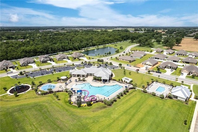 drone / aerial view with a water view