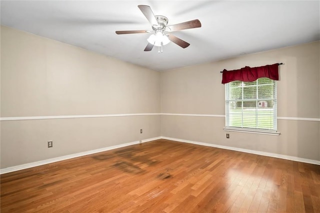 5175 Somerset Dr W, Mobile, AL 36619 - empty room with wood finished floors, baseboards, and a ceiling fan