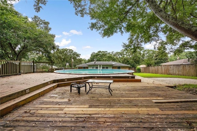 5175 Somerset Dr W, Mobile, AL 36619 - wooden deck with a fenced backyard