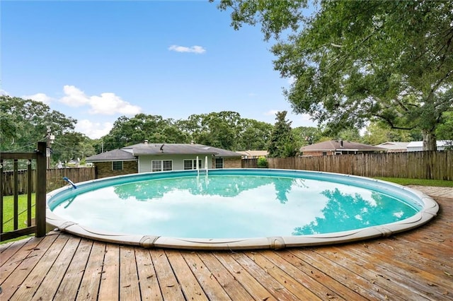 5175 Somerset Dr W, Mobile, AL 36619 - view of pool featuring a fenced backyard and a wooden deck