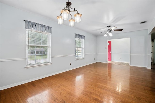 5175 Somerset Dr W, Mobile, AL 36619 - spare room featuring a ceiling fan, a chandelier, baseboards, and wood finished floors