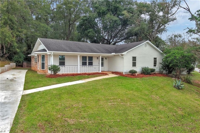 ranch-style house featuring a front yard and a porch