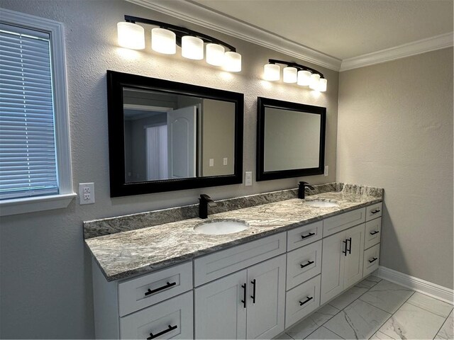 bathroom with crown molding, dual bowl vanity, and tile flooring