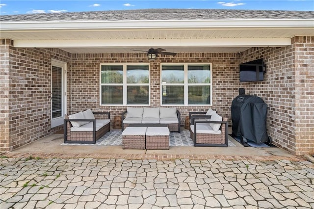 view of patio with area for grilling, an outdoor hangout area, and ceiling fan