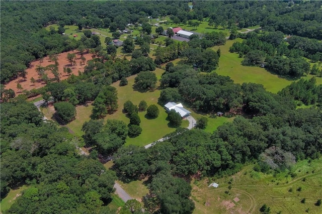 bird's eye view featuring a view of trees