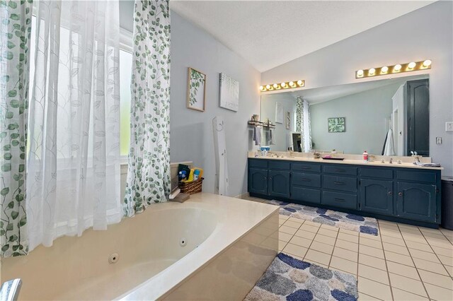 bedroom featuring carpet, ornamental molding, ceiling fan, and a tray ceiling