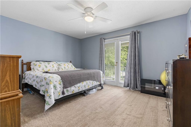 bedroom with carpet, ceiling fan, and access to outside