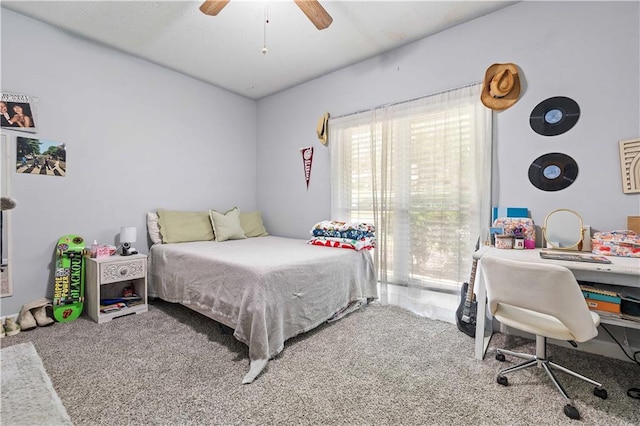 bedroom featuring ceiling fan and carpet flooring